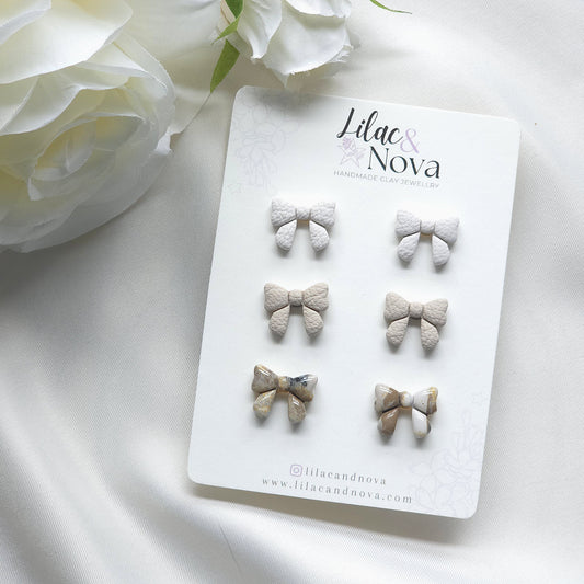 Neutral Imitation Leather Bow Studs